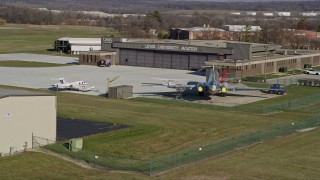 AX0168_0044 - 4K aerial stock footage of a commercial jet at Lewis University Airport in Romeoville, Illinois