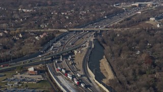 AX0169_0010 - 4K aerial stock footage of flying by heavy traffic on the Tri-State Tollway, Burr Ridge, Illinois