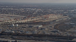 AX0169_0018 - 4K aerial stock footage of a wide view of a busy train yard in Southwest Chicago, Illinois