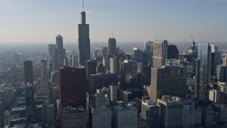 AX0169_0044 - 4K aerial stock footage fly past Willis Tower and nearby skyscrapers, Downtown Chicago, Illinois