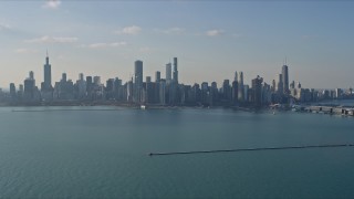 AX0169_0054 - 4K stock footage aerial video of a wide view of the city's downtown skyline, reveal Navy Pier, Downtown Chicago, Illinois