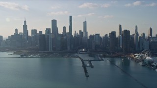 AX0169_0055 - 4K aerial stock footage of approaching the city's downtown skyline and Chicago River, Downtown Chicago, Illinois