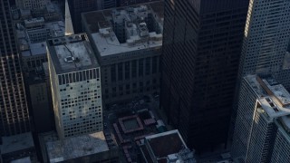 AX0169_0059 - 4K aerial stock footage of circling Chicago City Hall and skyscrapers, Downtown Chicago, Illinois