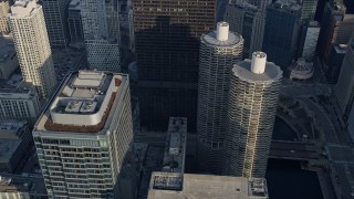 AX0169_0062 - 4K aerial stock footage of approaching and flying by Marina City skyscrapers, Downtown Chicago, Illinois
