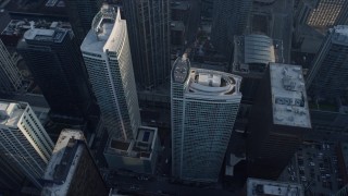 AX0169_0064 - 4K aerial stock footage of the Atwater Apartments and The Streeter skyscrapers, Downtown Chicago, Illinois