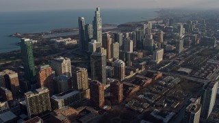 AX0169_0079 - 4K aerial stock footage of skyscrapers and city buildings near Field Museum, Downtown Chicago, Illinois