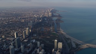 AX0169_0089 - 4K aerial stock footage of approaching the Lincoln Park Zoo from Downtown Chicago, Illinois