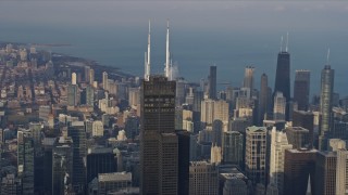 AX0169_0094 - 4K aerial stock footage of circling the top of Willis Tower, Downtown Chicago, Illinois