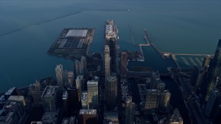 AX0169_0099 - 4K stock footage aerial video of flying high over Downtown Chicago, Illinois, and Navy Pier