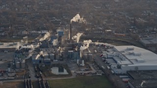 AX0169_0103 - 4K stock footage aerial video of flying by a factory in Southwest Side Chicago, Illinois
