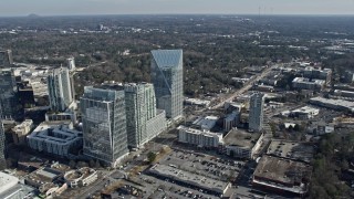 AX0171_0022 - 6.7K aerial stock footage of flying by Buckhead office buildings, Atlanta, Georgia
