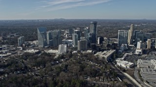 AX0171_0024 - 6.7K aerial stock footage of passing Buckhead office buildings and skyscrapers, reveal mall, Atlanta, Georgia