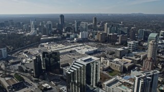 AX0171_0025 - 6.7K aerial stock footage of passing Buckhead office buildings, skyscrapers, and mall, Atlanta, Georgia