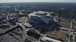 AX0171_0053 - 6.7K aerial stock footage of circling Mercedes-Benz Stadium in Atlanta, Georgia
