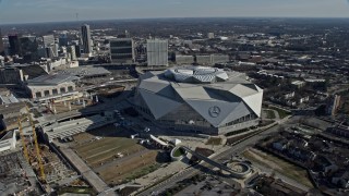 AX0171_0054 - 6.7K aerial stock footage of orbiting Mercedes-Benz Stadium in Atlanta, Georgia