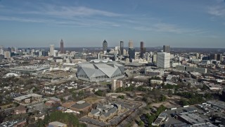 AX0171_0056 - 6.7K aerial stock footage fly toward Mercedes-Benz Stadium and Downtown Atlanta, Georgia