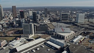 AX0171_0066 - 6.7K aerial stock footage orbit Omni Hotel, CNN Center and State Farm Arena in Downtown Atlanta, Georgia