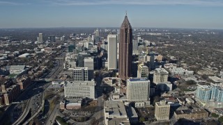 AX0171_0076 - 6.7K aerial stock footage of flying past Downtown Atlanta skyscrapers toward Midtown, Georgia