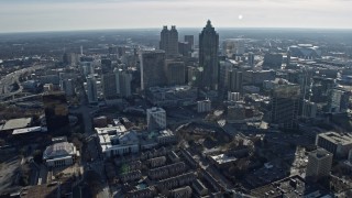 AX0171_0102 - 6.7K aerial stock footage tilt from apartment buildings to reveal Downtown Atlanta, Georgia