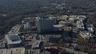 AX0171_0118 - 6.7K aerial stock footage of flying around the CDC buildings in Atlanta, Georgia