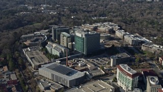 AX0171_0119 - 6.7K aerial stock footage of circling around the CDC buildings in Atlanta, Georgia