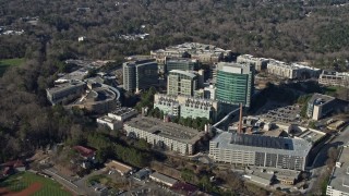 AX0171_0120 - 6.7K aerial stock footage of passing the Centers for Disease Control and Prevention in Atlanta, Georgia