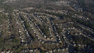 AX0171_0133 - 6.7K aerial stock footage of flying over suburban homes in Lawrenceville, Georgia