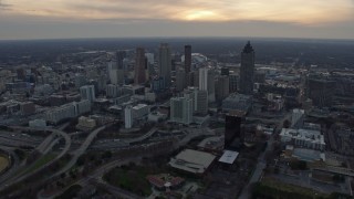 AX0171_0155 - 6.7K aerial stock footage of approaching Downtown Atlanta at sunset, Georgia