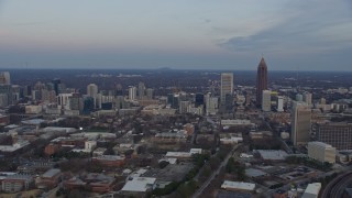 AX0171_0165 - 6.7K stock footage aerial video of skyscrapers and city buildings in Midtown Atlanta at sunset, Georgia