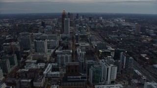 AX0171_0185 - 6.7K aerial stock footage approach Midtown skyscrapers and Downtown Atlanta at sunset, Georgia