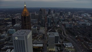 AX0171_0186 - 6.7K aerial stock footage fly past Midtown skyscrapers and toward Downtown Atlanta at sunset, Georgia