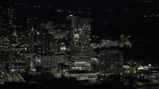 AX0171_0211 - 6.7K aerial stock footage of the Terminus office complex at night in Buckhead, Atlanta, Georgia