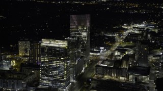 AX0171_0212 - 6.7K aerial stock footage of flying by the Terminus office complex at night in Buckhead, Atlanta, Georgia