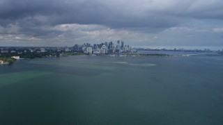 AX0172_002 - 6.7K aerial stock footage of approaching the downtown skyline of Miami, Florida