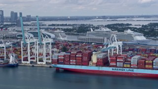 AX0172_019 - 6.7K aerial stock footage of cruise ships docked at the Port of Miami, Florida