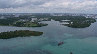 AX0172_029 - 6.7K aerial stock footage of approaching FIU Biscayne Bay Campus in North Miami, Florida