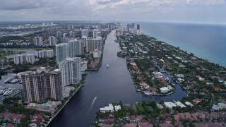 AX0172_033 - 6.7K aerial stock footage following the river between Aventura and Golden Beach neighborhoods in Florida