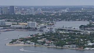 AX0172_042 - 6.7K aerial stock footage of approaching a bridge over the Stranahan River in Fort Lauderdale, Florida