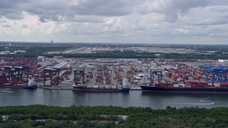 AX0172_066 - 6.7K aerial stock footage of cargo ships at Port Everglades, Florida