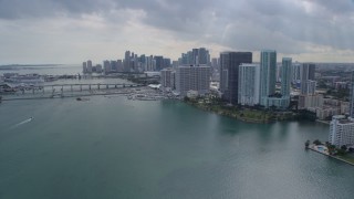 AX0172_079 - 6.7K aerial stock footage approach hotel and Downtown Miami skyline, Florida