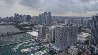 AX0172_080 - 6.7K stock footage aerial video flyby bayside hotel to reveal performing arts center, Downtown Miami, Florida
