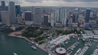 AX0172_083 - 6.7K aerial stock footage flyby Bayfront Park and Bayside Marina in Downtown Miami, Florida