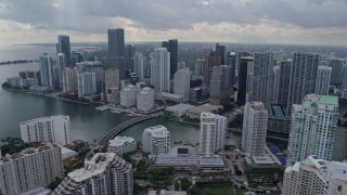AX0172_084 - 6.7K aerial stock footage of bayfront skyscrapers seen while passing Brickell Key in Downtown Miami, Florida