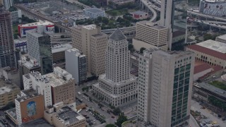 AX0172_091 - 6.7K aerial stock footage of circling the Miami-Dade County Courthouse in Downtown Miami, Florida