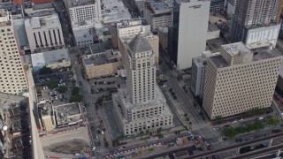 AX0172_114 - 6.7K aerial stock footage of flying past the Miami-Dade County Courthouse in Downtown Miami, Florida