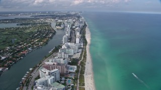 AX0172_137 - 6.7K stock footage aerial video tilt from the beach for a wide view of Miami Beach, Florida