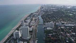 AX0172_138 - 6.7K aerial stock footage tilt from Indian River for a wide view of Miami Beach, Florida