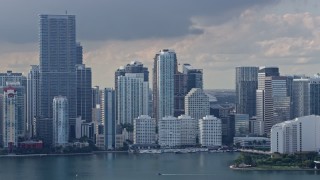 AX0172_147 - 6.7K stock footage aerial video of flying past Brickell Key and Downtown Miami skyscrapers, Florida