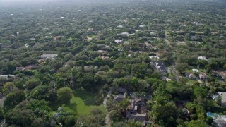 AX0172_159 - 6.7K aerial stock footage of flying over suburban neighborhoods in Pinecrest, Florida