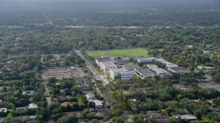 AX0172_160 - 6.7K aerial stock footage of a high school in Pinecrest, Florida